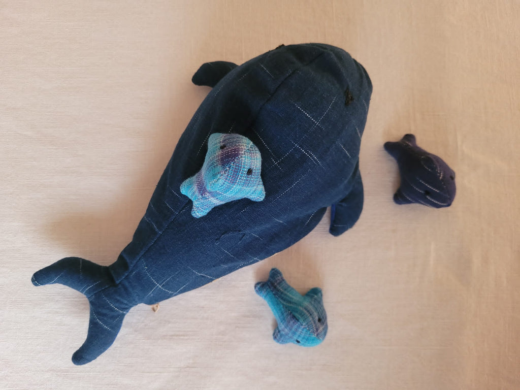 Whale with three gorgeous calves