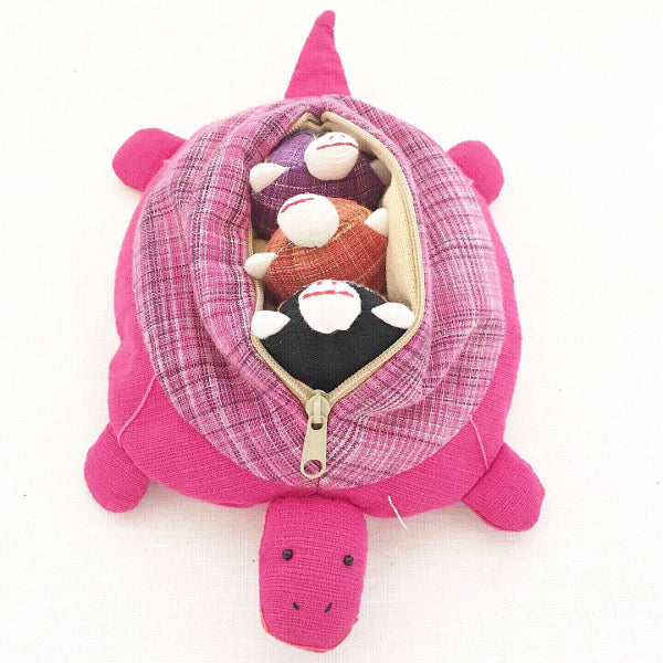 Mother tortoise and 3 removable baby tortoises