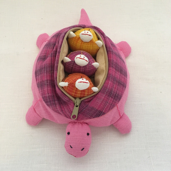 Mother tortoise and 3 removable baby tortoises