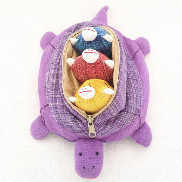 Mother tortoise and 3 removable baby tortoises