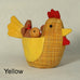 "Cluck  Cluck" marvellously plump Mother hen here with four small chicks safely nestled under her wings.