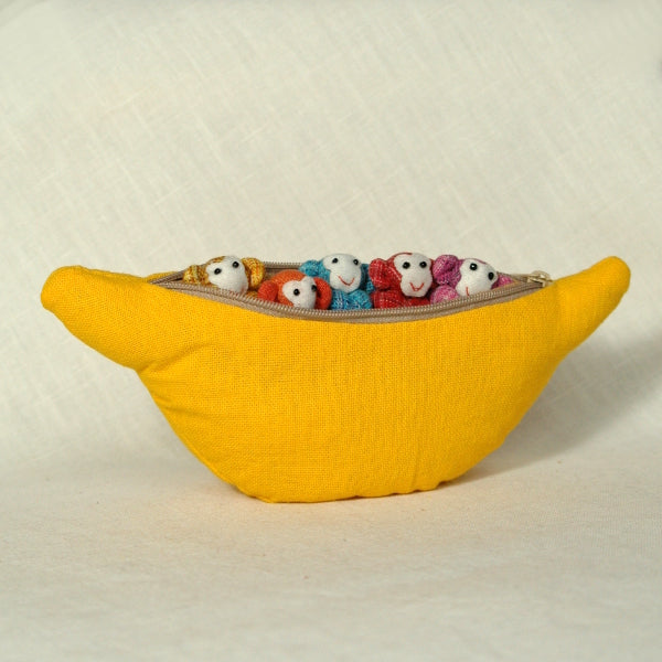 5 slightly naughty monkeys in a BIG banana