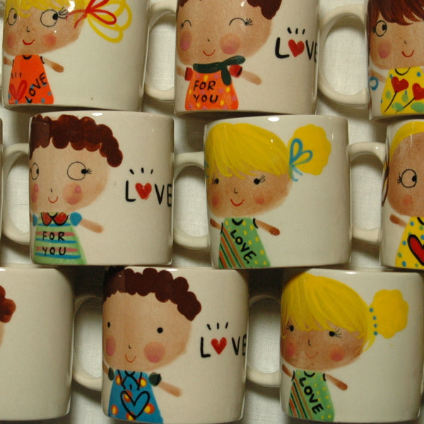Lovely little hand painted boy and girl mugs
