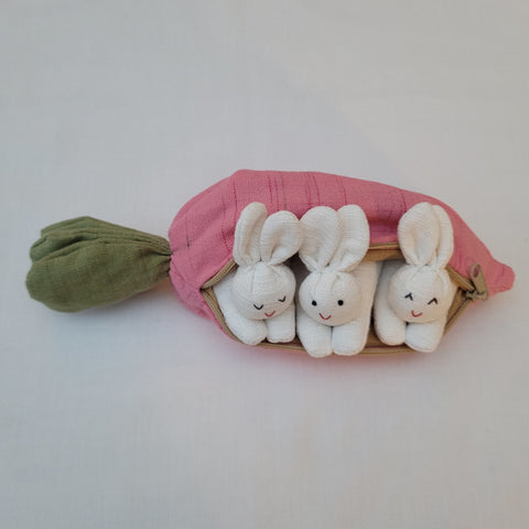 3 White Bunnies in a Pink Carrot. what fun!